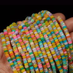 AAA+ Ethiopian Opal Disco Smooth Rondelle Bead Welo Opal Bead Multi Color Opal Cut Rondelle beads Opal Plain Beads Fire Opal Beads Stone: Opal Shape: Rondelle  Style: Faceted Beads Size: 3-5.5 mm approx Quality: AAA+ Grade High Quality If You Wants More Pictures Of Products Please Feel Free For Any Queries And Send Us Your Whatsapp Number That Will Help Us To Send You More Pictures And Every Detail Of Product. These Are Natural Gemstones Therefore, Variation In The Shade & Quality Is Expected. Gemstone Picture Shown Are Of Actual Gemstone That You Will Receive, However, The Color & Appearance May Look Slightly Different Depending On Your Monitor Resolution & Climatic Condition. Some Imperfections Can Be Expected As Stones Are Natural. If Required, Please Ask Us To Show The Lot Image Before Rainbow Spacer Beads For Jewelry Making, Rainbow Heart Beads For Jewelry Making, Rainbow Faceted Beads Bracelets, Adjustable Faceted Beads For Crafting, Multicolor Heishi Beaded Bracelets With Faceted Beads, Multicolor Polished Beads For Jewelry Making, Multicolor Heart Beads Round Beaded Bracelets, Multicolor Heart Beaded Necklaces With Round Beads, Rainbow Heart Shaped Beads