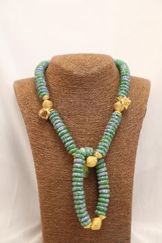 its and African make beeds, handedly made by a local and experienced beeds maker. Bohemian Rondelle Hand-strung Beads, Bohemian Rondelle Spacer Beads, Handmade Rondelle Artisan Beads, Handmade Artisan Rondelle Beads, Green Heishi Beads Round Beaded Necklace, Hand-strung Spiritual Heishi Beads, Spiritual Hand-strung Heishi Beads, Rondelle Beaded Necklace As A Gift, Rondelle Beaded Necklace For Gift