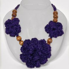 Handmade Crochet Purple Flower Necklace. Has Wood Accent Beads And Is On Silver Chain With Lobster Clasp. New With Tags. Adjustable From 20” To 25”. Please Contact Me If You Have Any Questions. Want To See More Handmade Items From Fancy Knots? Visit Fancyknots.Com. Purple Bohemian Crochet Jewelry, Handmade Bohemian Purple Flower Necklace, Adjustable Purple Flower Necklace, Handmade Purple Bohemian Flower Necklace, Handmade Adjustable Purple Flower Necklace, Handmade Purple Flower Necklace For Gift, Purple Flower-shaped Beaded Jewelry, Bohemian Purple Flower Necklace, Purple Bohemian Flower Necklace