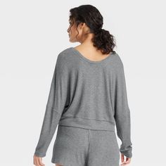 Stay effortlessly comfortable as you lounge around the house in this Cozy Ribbed Pullover from Auden™. Made from lightweight, super-comfy soft-brushed rib fabric with spandex, this long-sleeve pullover top hits at the hip. Designed with a V-neck and a relaxed fit, it's sure to be your new fave lazy-day pick. Auden™: Comfort true to every shape & hue. Rib Fabric, High Neck Tank Top, Top Hits, High Neck Tank, Workout Tank Tops, Ribbed Fabric, Dolman Sleeve, Long Sleeve Pullover, Dark Gray