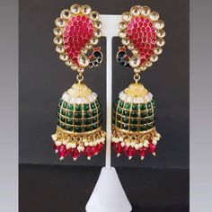 Light weight ,elegant design,different piece Elegant Multicolor Jhumkas For Festive Occasions, Elegant Jhumkas With Peacock Design For Celebrations, Elegant Festive Jhumkas With Peacock Design, Elegant Peacock Design Jhumkas For Celebration, Elegant Multicolor Peacock Design Jhumkas, Traditional Peacock Design Danglers For Party, Traditional Peacock Danglers For Party, Elegant Party Danglers With Cutdana, Elegant Multicolor Kundan Jhumkas