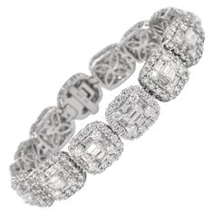 Sensational illusion set diamond bracelet with the look of emerald cut diamonds. High jewelry by Alexander Beverly Hills. 15.40 carats total of round and baguette cut diamonds. Approximately G/H color and VS clarity. 18k white gold, 6.25in. Accommodated with an up-to-date digital appraisal by a GIA G.G. once purchased, upon request. Please contact us with any questions. Item Number B3579 Modern Diamond Jewelry, Bling Bra, White Gold Diamond Bracelet, Tanzanite Bracelet, Peridot Bracelet, Malachite Bracelet, Expensive Jewelry Luxury, Gold Bracelet Set, Set Bracelet