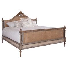 the bed is made with wicker and wood