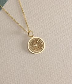 14K Real Solid Gold  clock gold necklace ● Material of pendant: Solid Gold 14k ( REAL GOLD ) ● Metal Stamp: 14L ( REAL GOLD ) ● The pendant is available in 6 sizes: - 14,0 mm / 0,55 inches ( Diameter ) In the photos - 15,3 mm / 0.60 inches ( Diameter ) - 16,5 mm / 0,65 inches ( Diameter ) - 19,1 mm / 0,75 inches ( Diameter ) - 21 mm / 0,82 inches ( Diameter ) - 23 mm / 0.90 inches ( Diameter ) ( In the photos the size is 14mm / 0.55 inches Diameter ) ( Jump Ring inner diameter: 4 mm ) ● Material Timeless 14k Gold Coin Pendant Necklace, Yellow Gold Charm Necklace With Coin Pendant, 14k Yellow Gold Tarnish Resistant Charm Necklace, Yellow Gold Plated Round Charm Necklace, Classic Yellow Gold Charm Necklace With Coin Pendant, 14k Yellow Gold Medallion Charm Necklace, Timeless Gold Charm Necklaces With Pendant, Timeless Gold Charm Necklace Pendant, Timeless Gold Charm Pendant Necklaces