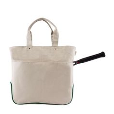 a white canvas bag with a black handle