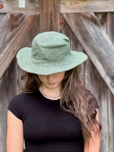 Eco-friendly Hemp Sun Hat - Solid Our hemp sun hat is perfect for any time or anywhere..at the beach, pool, gardening, festival or just hanging around. Solid Color options: Natural or Olive Green Hemp sun hat made from 100% hemp with a soft organic cotton lining, wire brim makes it easy to reshape. Wide brim perfect to protect your head and face from too much sun. This hat is lightweight and flexible so that can be folded for easy carrying. Easily gets back in shape 100% Hemp Adult size - availa Bohemian Lightweight Brimmed Hat, Bohemian Brimmed Lightweight Hat, Adjustable Cotton Beach Hat, Adjustable Cotton Hat For The Beach, Lightweight Bohemian Hat With Curved Brim, Eco-friendly Short Brim Hat For Vacation, Cotton Wide Brim Hat For Beach Season, Bohemian Lightweight Brimmed Sun Hat, Bohemian Lightweight Brimmed Panama Hat