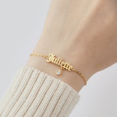 "A simply stunning name bracelet with a little hanging birthstone charm. It will be a super cute and dainty gift for anyone you love. ► PRODUCT INFORMATION * Material: High Quality Solid 925 Sterling Silver * Finishing: Silver, Gold or Rose Gold. * Word limits: up to 9 characters for best visibility. * Letter size: approx. 7/32 ~ 5/16 inch (5.4 - 8.1mm) * Sizing are as follow: XS: bracelet's diameter is 2\", bracelet's circumference is 6\" S: bracelet's diameter is 2.25\", bracelet's circumferen Dainty Nameplate Bracelet For Personalized Gift, Elegant Custom Name Charm Bracelet As Birthday Gift, Elegant Custom Name Charm Bracelet For Birthday Gift, Elegant Custom Name Charm Bracelet For Birthday, Dainty Charm Bracelet For Personalized Gift, Minimalist Personalized Name Bracelet For Birthday Gift, Personalized Minimalist Name Bracelet For Birthday Gift, Minimalist Personalized Name Bracelet For Birthday, Dainty Custom Name Charm Bracelet For Gift