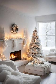 a living room filled with white furniture and christmas decorations