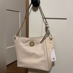 Beautiful Leather And Woven Straw Shoulder Bag From Tory Burch. Brand New With Tags And Dust Bag. 11"W X 10"H X 5 1/2 "D Neutral Shoulder Bag With Gold-tone Hardware For Shopping, Cream Hobo Bag With Gold-tone Hardware For Shopping, Beige Hobo Bag With Gold-tone Hardware For Shopping, Tan Shoulder Bag With Braided Handles For Errands, Beige Shoulder Bag With Gold-tone Hardware For Shopping, Neutral Shoulder Bag With Gold-tone Hardware, Elegant Tan Bags With Braided Handles, Beige Hobo Bag With Gold-tone Hardware And Double Handle, Beige Hobo Bag With Double Handle And Gold-tone Hardware