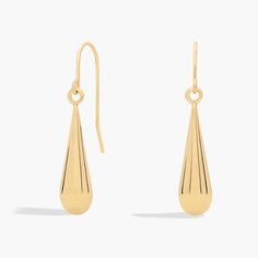 These classic 14k yellow gold teardrop earrings are perfect for everyday wear or any special occasion. Timeless Teardrop Earrings With Polished Finish, Timeless Teardrop Polished Earrings, Elegant 14k Gold Linear Earrings With Polished Finish, Modern Durable Teardrop Earrings For Formal Events, Timeless Teardrop Tarnish-resistant Earrings, Modern Tarnish Resistant Teardrop Earrings For Formal Occasions, Classic Long Drop Earrings With Polished Finish, Modern Teardrop Yellow Gold Linear Earrings, Elegant Long Drop Teardrop Earrings With Polished Finish