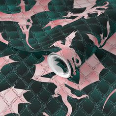 an abstract pink and green wallpaper with dragon designs on it's side,