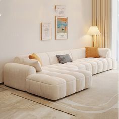 a living room with a large white couch