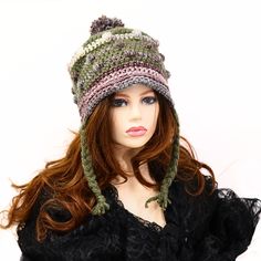 Comfortable and fun to wear, this soft funky and bumpy Fae snow hat has braids for ties. The top has a matching pom pom and the body has textural bumps worked in, giving a rustic feel to your look. You can roll back the brim to give a different look, or leave a bit of a brim. I've shaped it to sit secure on your head and cover your ears so you can wear it untied, but the braids are still long enough to tie if you want to. Great for skiing, sledding, going to an outdoor market, running your erran Beanie With Braids, Hat With Pom Pom, Snow Hat, Outdoor Market, Boho Green, Slouchy Hat, Pom Pom Hat, Rustic Feel, Walkway