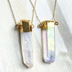 "Listing is for one Angel Aura crystal quartz Point Pendant Connector Stone Size: approx. 13-15mm x 47-55mm Can choose just pendant or pendant with chain necklace Drill Hole: drilled STOCK PHOTOS-- Pendants will vary slightly as to the shape and size of crystal Quartz, making each ring unique. Quartz is a power stone. It has been called the \"Universal Crystal\" because of its many uses. It enhances energy by absorbing, storing, amplifying, balancing, focusing and transmitting." Iridescent Pendant Crystal Necklace For Healing, Iridescent Crystal Gemstone Necklaces For Spiritual Use, Spiritual Iridescent Crystal Necklace With Gemstone, Iridescent Spiritual Gemstone Crystal Necklace, Iridescent Gemstone Crystal Necklace For Spiritual Use, Gold Quartz Crystal Necklace As Gift, Gold Quartz Crystal Necklace For Gift, Gold Quartz Crystal Necklaces For Jewelry Making, Mystical Gold Crystal Necklaces With Gemstone