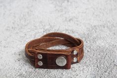 "Best Father's Day gift! Handmade, hand-braided leather bracelet. Great piece of men jewelry! Gift packaging! Super comfortable & easy to wear. Great, meaningful gift idea. ----- PERSONALIZATION: ------- Family name, special date, initials, coordinates can be engraved on the outside of the bracelet. If you want your date to be in Roman Numerals please mention that in the note to seller and provide the date in Roman numerals. ★Notice One line max 12 letters How to order MATCHING BRACELETS: Pl Handmade Leather Wrap Bracelet For Gift, Handmade Leather Wrap Bracelet Gift, Distressed Brown Leather Bracelets As Gift, Vintage Brown Wrap Bracelet Gift, Vintage Brown Wrap Bracelet, Masculine Everyday Jewelry With Leather Strap, Vintage Brown Leather Bracelet As A Gift, Vintage Brown Leather Bracelet As Gift, Vintage Brown Leather Strap Bracelet As Gift