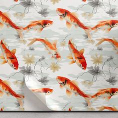 a wallpaper with gold fish and flowers on it