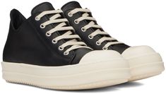 Low-top abrasion-resistant grained calfskin sneakers in black. · Cap toe · Lace-up closure · Eyelets at inner side · Logo-embossed padded calfskin footbed · Buffed calfskin lining · Treaded thermoplastic rubber sole Supplier color: Black/Milk/Milk Black Sneakers With Vulcanized Sole In Calf Leather, Black Calf Leather Sneakers With Vulcanized Sole, Black Casual High-top Calf Leather Sneakers, High-top Sneakers With Leather Sole For Sports, Black Milk, Black Cap, Rick Owens, Low Top, Calf Skin