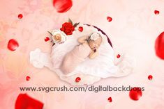 there is a baby that is sleeping on a bed with roses and petals around it