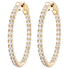 Crafted with meticulous attention to detail, these 18 Karat White Gold Diamond Hoop Earrings are the epitome of luxury and sophistication. Each earring is adorned with a stunning 2.84 carats of brilliant-cut diamonds, set in a secure prong setting that maximizes their sparkle and shine. The diamonds are arranged in a continuous hoop design, providing an uninterrupted stream of brilliance that catches the light from every angle. The sleek white gold setting complements the diamonds' radiance, adding a modern touch to this timeless piece. These earrings are designed to make a statement, whether you're dressing up for a special occasion or adding a touch of elegance to your everyday look. With a secure latch-back closure, these hoops offer both style and comfort, ensuring they stay in place a Earring Video, Modern Hoop Earrings, Gold Diamond Hoop Earrings, Dazzling Earrings, Hoop Design, Hoop Earring Sets, Gold Diamond Earrings, Diamond Hoop Earrings, Stunning Earrings