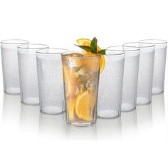 a set of six glasses filled with different types of drinks