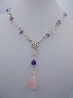 "This is a lovely vintage sterling silver & stone chips necklace. Very feminine, this silver necklace has a pale pink faceted stone pendant which has nice color & depth. The stone chips are translucent, pink & purple & there is a toggle clasp front close. This dainty necklace is 19\" long." Pink Sterling Silver Jewelry With Round Beads, Pink Pendant Crystal Necklace With Natural Stones, Handmade Pink Drop Jewelry, Pink Rose Quartz Crystal Necklace With Natural Stones, Pink Amethyst Spiritual Jewelry, Pink Sterling Silver Pendant Crystal Necklace, Pink Sterling Silver Crystal Gemstone Necklace, Silver Jewelry With Rose Quartz Gemstone Beads, Rose Quartz Jewelry With Round Beads And Stones