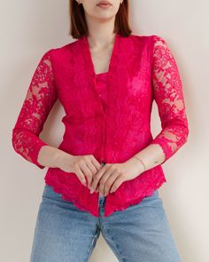 Prettiest vintage long sleeve fitted lace blouse in purple/pink.  Such gorgeous vintage piece, absolutely love! Size EU34/UK6. Model usually wears size UK6/EU34 and is 168cm tall.  Great condition,keep in mind that it is vintage item and signs of natural wear/age might appear.  If you have any questions about item don't hesitate to message us.  When buying from HungerVintage you support small sustainable business.  Thank you!  Orders over 50 are shipped in reusable compostable mailers.  We are w Pink Fitted Lace Top, Purple Fitted Lace Top, Fitted Purple Lace Top, Elegant Fitted Pink Lace Top, Pink Long Sleeve Lace Top Blouse, Fitted Purple Top With Lace Trim, Fitted Long Sleeve Lace Top, Fitted Pink Lace Top With Lace Trim, Formal Long Sleeve Lace Top With Lace Sleeves