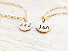 "※Charm Diameter: 10mm (3/8\") tall ※Necklace lengths: 18\" (hers) and 20\" (his); can be made different lengths by request in the personalization box These personalized necklaces features a solid brass disc that will be hand stamped with two initials of your choice separated by an & sign. The charm is attached to a fine gold-plated chain with a lobster clasp closure. By default, the stampings will be blackened and in uppercase. Please leave a note in the personalization box if you would pre Necklaces Initials, Initials Jewelry, Couples Necklace, Jewelry For Him, 20th Birthday Gift, Girlfriend Jewelry, Gift For Valentines Day, Initial Necklaces, Cute Couple Gifts