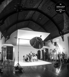 black and white photograph of people in a studio