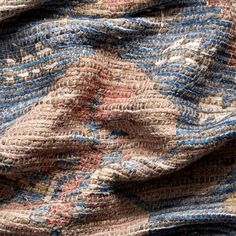 a close up view of a red and blue fabric