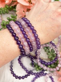 Amethyst beaded stretch bracelets are a popular accessory for those who love the beautiful purple hue of amethyst gemstones. Available in light and dark options of natural purple amethyst! These bracelets are made of small, polished amethyst beads strung together on an elastic cord, making them easy to slip on and off the wrist. Amethyst is known for its spiritual and healing properties, and wearing an amethyst beaded stretch bracelet is said to promote inner peace, clarity, and balance. Additio Purple Crystal Bracelet With 8mm Beads As A Gift, Spiritual Lavender Beaded Bracelets As Gift, Amethyst Stretch Bracelet With Round Beads For Gift, Spiritual Purple Crystal Bracelet, Purple Gemstone Beads Stretch Bracelet As Gift, Lavender Amethyst Beaded Bracelets For Meditation, Purple Stretch Bracelet With Gemstone Beads As Gift, Amethyst Stretch Bracelet With 8mm Beads As Gift, Spiritual Purple Crystal Bracelet For Meditation