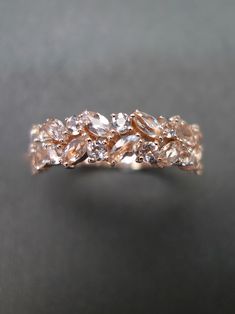 an image of a wedding ring with diamonds