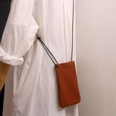 Overview: Design: Cute Brown LEATHER Side Bag Phone WOMEN SHOULDER BAG Slim Phone Crossbody Pouch FOR WOMENIn Stock: 3-5 days For MakingInclude: A Shoulder BagCustom: NoLeather: CowhideMeasures: L 11cm x W 1cm x H 17.5cmWeight: 0.13 kgSlots: 1 main slot,Accessories(option): NoneStyle: Cute Brown LEATHER Side Bag Phone WOMEN SHOULDER BAG Slim Phone Crossbody Pouch FOR WOMENVery durable (At least 5 Years) and it should last a life time Note: Each Item will have very slight variances to the picture Chic Leather Pouch With Cell Phone Pocket, Chic Leather Mobile Phone Pouch, Chic Soft Leather Pouch Phone Bag, Soft Leather Phone Bag Pouch For On-the-go, On-the-go Soft Leather Pouch Phone Bag, Leather Mobile Phone Pouch For On-the-go, Brown Crossbody Phone Bag For Everyday, Brown Everyday Crossbody Phone Bag, Versatile Soft Leather Phone Pouch Bag