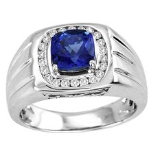 A grand manly finger ring with a cushion cut tanzanite of around 1.150 carats enclosed with almost 22 diamonds of 0.200 carats renders it a magnificent look. It could be a perfect present to your spouse on his special occasion. It can go well with any attire making him look more dashing. It is a timeless and ageless accessory that fits in well with any occasion accentuating the grace of the ambience with its divine aura. Product Information SKU TTADR50093 Metal Type 14k Metal Color White Gold St Tanzanite Rings, Mens Bling, Men Jewellery, Gold Silver Jewelry, Gents Ring, Mens Gemstone Rings, Tanzanite Jewelry, Men Rings, Cushion Cut Diamond