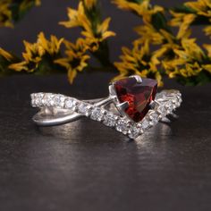 "Womens sterling silver garnet promise ring, Art deco promise ring for her,Garnet engagement ring,Trillion cut red garnet ring,Garnet jewelry WE OFFER UNLIMITED PERIOD INSTALLMENTS PLAN This is a beautiful, stunning, feminine ring that works well for all occasions, styles, and ages. You will love it! Ring information Main stone: White cubic zirconia Approximate size: 6x6x6mm Accent stones: White cubic zirconia Approximate size: 1.5mm (19 stones) Metal type: Silver Metal stamp: 925 Sterling SIlve Garnet Birthstone Promise Ring In Fine Jewelry Style, Formal Garnet Birthstone Ring In Fine Jewelry Style, Elegant Garnet Ring With Prong Setting, Formal Garnet Birthstone Ring Fine Jewelry, Formal Garnet Birthstone Ring, Garnet Rings With Prong Setting In Fine Jewelry Style, Fine Jewelry Garnet Ring With Prong Setting, Formal Garnet Rings With Accent Stones, Garnet Open Ring Promise Ring