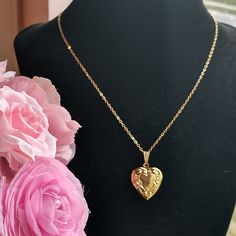 These engraved heart shaped lockets are ready to ship tomorrow.   These gold toned lockets are similar to the one worn by Barbie in the recent movie.  The rose gold plated is a miniature locket.  They are really cute, shiny and are great for anyone who likes Boho Chic or Cottage core styles. Like everything else here in HollysPrivateIdaho, they were made with love in a smoke-free home. To see other boho chic and cottage core lockets and necklaces, just click on the link below: https://www.etsy.c Gold Heart Pendant Locket Necklace With Hallmark, Heirloom Engraved Locket Necklace For Valentine's Day, Mother's Day Heart Locket Necklace With Hallmark, Vintage Gold Heart Necklace For Mother's Day, Hallmarked Medallion Jewelry For Valentine's Day, Heirloom Locket Necklace For Valentine's Day, Gold Heart Necklace With Hallmark, Gold Locket Necklace With Hallmark For Mother's Day, Gold Locket Necklace For Mother's Day With Hallmark