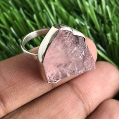 CYBER MONDAY SALE - Holiday season sale Natural Raw ROSE QUARTZ Sterling Silver 925 Ring. ROSE QUARTZ is in raw form and it has a beautiful intense vivid color. For other sizes please message with the ring size. The Ring shown in the picture is in the COLLAR setting. Another setting is in the PRONGS setting. Same Design and Setting are available in other Gemstones as shown in the last image. Ring size available in the photo is US 5 3/4 and ready to be dispatched the same day. Other sizes are mad Elegant Raw Stone Gift Rings, Gift Rings With Raw Stone, Gift Rings With Raw Stone In Open Ring Shape, Unique Rings With Raw Stone For Gift, Spiritual Crystal Ring With Raw Stone For Gifting, Spiritual Raw Stone Crystal Ring Gift, Natural Stones Open Ring Gemstones Gift, Gift Crystal Open Ring With Raw Stone, Adjustable Crystal Ring With Raw Stone For Gift