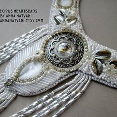 Bohemian Embroidered Jewelry For Wedding, Traditional Embellished Wedding Necklaces, Unique Silver Embellished Jewelry, Bohemian White Jewelry With Rhinestones, Traditional Silver Beaded Bridal Necklace, Bohemian Embellished Necklaces For Weddings, Bohemian Silver Beaded Bridal Necklace, White Embellished Jewelry For Parties, Traditional Silver Embroidered Jewelry