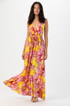 Bound towards adventure with a little magic and plenty of wonder. From its elastic straps to its flattering deep V neckline, the Hope Maxi Dress brings a whimsical vibe to any occasion. This maxi is complemented with a low back and strappy detail for your summer glow up. Details: 100% Rayon Hand wash cold & Lay flat to dry Features: Unlined skirt, Lined bodice, V-neck bodice, Optional snap closure for additional coverage on bodice, Elastic straps and elastic waist for customized fit, Side cutout Summer V-neck Dress With Elastic Back, Multicolor V-neck Maxi Dress With Smocked Back, Bohemian V-neck Dress With Adjustable Straps, Spring V-neck Dress With Elastic Back, Summer V-neck Sundress With Smocked Back, Pink Bohemian Maxi Dress With Adjustable Straps, Pink V-neck Sundress With Tie Back, V-neck Sundress With Smocked Back For The Beach, Bohemian V-neck Sundress With Smocked Back