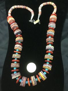 "A beautiful necklace with spiny oyster in orange, yellow and purple, divide with turquoise beads. Measures 30\" long , very colorful." Navajo Wedding, Oyster Necklace, Horse Hair Pottery, Navajo Pottery, Wedding Vases, Yellow And Purple, Spiny Oyster, Pottery Pieces, Beaded Necklaces