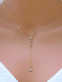 "CZ Drop in14k Gold Fill Necklace. Bridal jewelry. Layering necklace. It is sending alone and prefect for combination. All metal components onto Sterling silver . The picture length is 16\". The necklace is made of.. - 4mm 3 of 14k gold fill 3mm CZ dots, - 5mm 14k gold fill CZ dots, -14k gold fill Cable chain with spring claw. -Come up with ribbon gift box and -One Set of Care instruction package. Gold Layered https://www.etsy.com/listing/215630452/double-layered-gold-initial?ref=shop_home_activ Double Gold Necklace, Rose Gold Diamond Necklace With Adjustable Chain For Wedding, Delicate Chain Cubic Zirconia Backdrop Necklace As A Gift, Adjustable Yellow Gold Wedding Jewelry, Adjustable Yellow Gold Jewelry For Wedding, Cubic Zirconia Backdrop Necklace With Clavicle Chain As Gift, Backdrop Necklace With Clavicle Chain As Gift, Cubic Zirconia Clavicle Chain Backdrop Necklace As Gift, Delicate Diamond Necklace With Adjustable Chain For Wedding