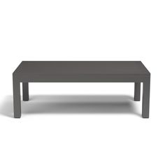 a gray table sitting on top of a white floor