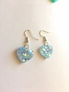 Light Blue Glittery Heart Earrings Handmade Dainty Dangle - Etsy Blue Pierced Heart Drop Earrings, Blue Pierced Heart Earrings For Gift, Blue Pierced Heart Earrings As Gift, Blue Pierced Heart Earrings, Blue Hypoallergenic Heart Earrings, Hypoallergenic Blue Heart Earrings, Blue Dangle Heart Earrings For Party, Cute Handmade Light Blue Earrings, Blue Dangle Heart Pierced Earrings