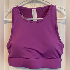 Nwt Fabletics Trinity High Impact Sports Bra Size S /6 Color: Bright Fig / Multi I Love These For Running With My Phone Stock Photo Shown For Fit Only Product Description We Turned Our Best-Selling Trinity Pocket Legging Into An Oh-So-Cute Bra For The First Time Ever! Naturally, We Crafted This High-Impact Style With The Same Innovative Triple-Pocket Designso You Can Keep Essentials Handy At Your Next Workout. Features Moisture-Wicking Breathable 4-Way Stretch Removable Bra Cups Pockets Fabric K Purple Sleeveless Sports Bra For Yoga, Purple Stretch Activewear For Sports, Purple Breathable Activewear For Training, Purple Breathable Activewear For Sports, Purple Breathable Sports Activewear, Purple Sleeveless Activewear For Training, Purple Moisture-wicking Functional Activewear, Purple Sleeveless Sportswear Activewear, Purple Sleeveless Activewear