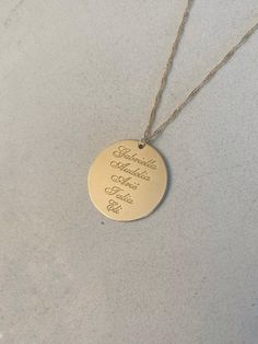 A beautiful MOM and grandma necklace with names engraved.  We can personalize the with anything you would like, names or initials of loved ones: Children, grandchildren ,or smooth. The necklace is made in 18K gold plating or 925 sterling silver. The necklace will arrive gift-wrapped and packed in a padded envelope to maintain the product Thank you for your interest. Please check out our other items and be sure to add us to your favorites! https://www.etsy.com/shop/Limajewelry We look forward to the opportunity of serving you. Custom Name Necklace With Round Pendant For Anniversary, Round Pendant Necklace With Name For Anniversary, Name Necklace With Engraving Option For Mother's Day Gift, Mother's Day Gift Name Necklace With Engraving Option, Name Necklace For Anniversary Gift, Gold Name Necklace With Engraving For Mother's Day, Engraved Name Necklace For Anniversary, Custom Round Name Necklace For Anniversary, Mother's Day Engraved Name Pendant Necklace