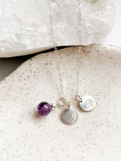 Featuring your choice of a birthstone on a dainty sterling silver chain. OPTIONAL: Personalise your necklace with a small sterling silver charm, hand stamped with an uppercase initial or symbol of your choosing (only one per charm).  If you wish to add more than one charm, you can purchase additional charms by adding them to your cart separately: https://www.etsy.com/au/listing/898692437/hand-stamped-charms-14k-gold-filled Please note that this is made to order. Refer to the necklace length guide in the product images to determine your length. Currently 40cm, 45cm and 50cm is available. - Approximate birthstone pendant length: 14mm - Hand stamped charm size: 10mm UNIQUE PIECES Each stone is natural and unique, no two stones are alike and will feature natural imperfections or inclusions and Silver Dainty Birthstone Charm Necklaces, Silver Charm Necklaces With Birthstone For Personalized Gift, Adjustable Sterling Silver Birthstone Charm Necklace, Silver Charm Necklaces With Birthstone And Dangle Shape, Silver Charm Necklace For May Birthstone, Personalized Gift, Necklace Length Guide, Hand Stamped Necklace, Birthstone Pendant, Star Necklace