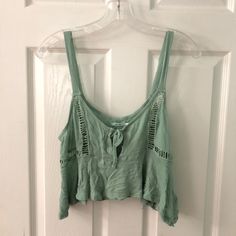 Cute Flowly Crop Top From Urban Outfitters. New Never Worn With Tags On Still. Casual Cropped Tank Top For Day Out, Urban Outfitters Cropped Tops For Summer, Spring Casual Crop Tank Top, Green Crop Top For Spring And Summer, Cropped Green Tops For Beach Season, Casual Cropped Tank Top For Summer, Casual Green Crop Top For Spring, Urban Outfitters Casual Crop Top, Casual Cropped Tops For Summer