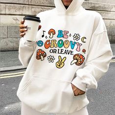 Groovy Oversized Sweatshirt, 80s Retro Womens Hoodie, Trendy Tiktok VSCO Pinterest Graphic Hoody, Cosy Hippie Hoody, Retro Quote Hoody Cute and Aesthetic Retro Hoodie resonating a classic vintage 80s charm with text that reads 'Be Groovy or leave' MADE TO ORDER ITEM - - FEATURES - - * Available in multiple colors, styles, and sizes  * 50% pre-shrunk cotton, 50% polyester * Medium Fabric (8.0 oz/yd (271.25 g/m)) * Front pouch pocket * Air-jet spun yarn with a soft feel and reduced pilling * Doubl Oversized Cartoon Print Trendy Sweatshirt, Oversized Cartoon Print Sweatshirt, Trendy Oversized Cartoon Print Sweatshirt, Spring Vintage Hoodie With Relaxed Fit, Vintage Relaxed Fit Hoodie For Spring, Retro Winter Sweatshirt With Drawstring Hood, Vintage Letter Print Hoodie For Winter, Vintage Hooded Tops With Letter Print, Retro Cotton Hooded Sweatshirt