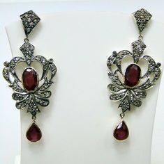 ITEM-VICTORIAN DIAMOND Ruby, 14 CT GOLD & STERLING SILVER EARRINGS. SIZE-5.5 /2.25 CM, TOTAL WEIGHT-13 GRAMS, Ruby WEIGHT-12 CT, OLD CUT FLAT ROUND DIAMOND WEIGHT-3 CT, 14 CT GOLD WEIGHT-3 GMS ALL STONES ARE NATURAL AND OF HIGH QUALITY. MATERIAL-14 CT SOLID GOLD , SILVER, DIAMOND ,Ruby. Ornate Gemstone Earrings For Formal Occasions, Luxury Hallmarked Dangle Jewelry, Ornate Gemstone Dangle Earrings, Luxury Ruby Gemstone Earrings, White Gold Ruby Gemstone Earrings, Ruby Gemstone Earrings In White Gold, Gold Ruby Earrings With Diamond Accents, Luxury Ruby Jewelry With Rose Cut Diamonds, Luxury Hallmarked Ruby Earrings