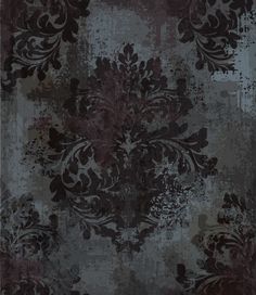 an area rug with various colors and designs on it