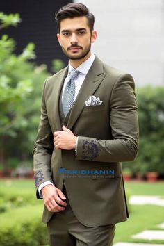 =>UNIQUE CREATION - PLEASE RESPECT COPYRIGHT<= All images and content on this site are exclusively crafted and owned by Paridhanin. Unauthorized copying, sharing, or reproduction is prohibited and will be subject to legal action. This olive green wedding suit is designed for the contemporary groom. Featuring subtle yet intricate embroidery on the cuffs, it offers a perfect blend of tradition and modernity. Made from high-quality fabric, this suit provides a sharp and tailored fit, ideal for making a stylish statement on your special day. The price includes Jacket, pant and vest only. Other accessories if you want like shirt , tie and pocket square will be available on extra cost. For this message us in personalisation box. The suit is meticulously crafted from a luxurious  polyester blende Outfit For Groom, Wedding Suit For Men, Olive Green Suit, Green Wedding Suit, Olive Green Weddings, Army Green Coat, Party Reception, Couple Wedding Dress, Yacht Party